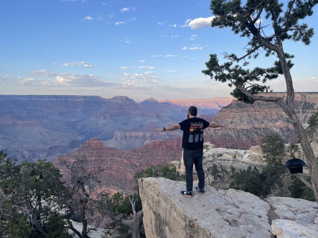 Bogdan tries to embrace the Grand Canyon