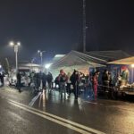 A row of emergency services tents welcoming refugees at the Romania-Ukraine border