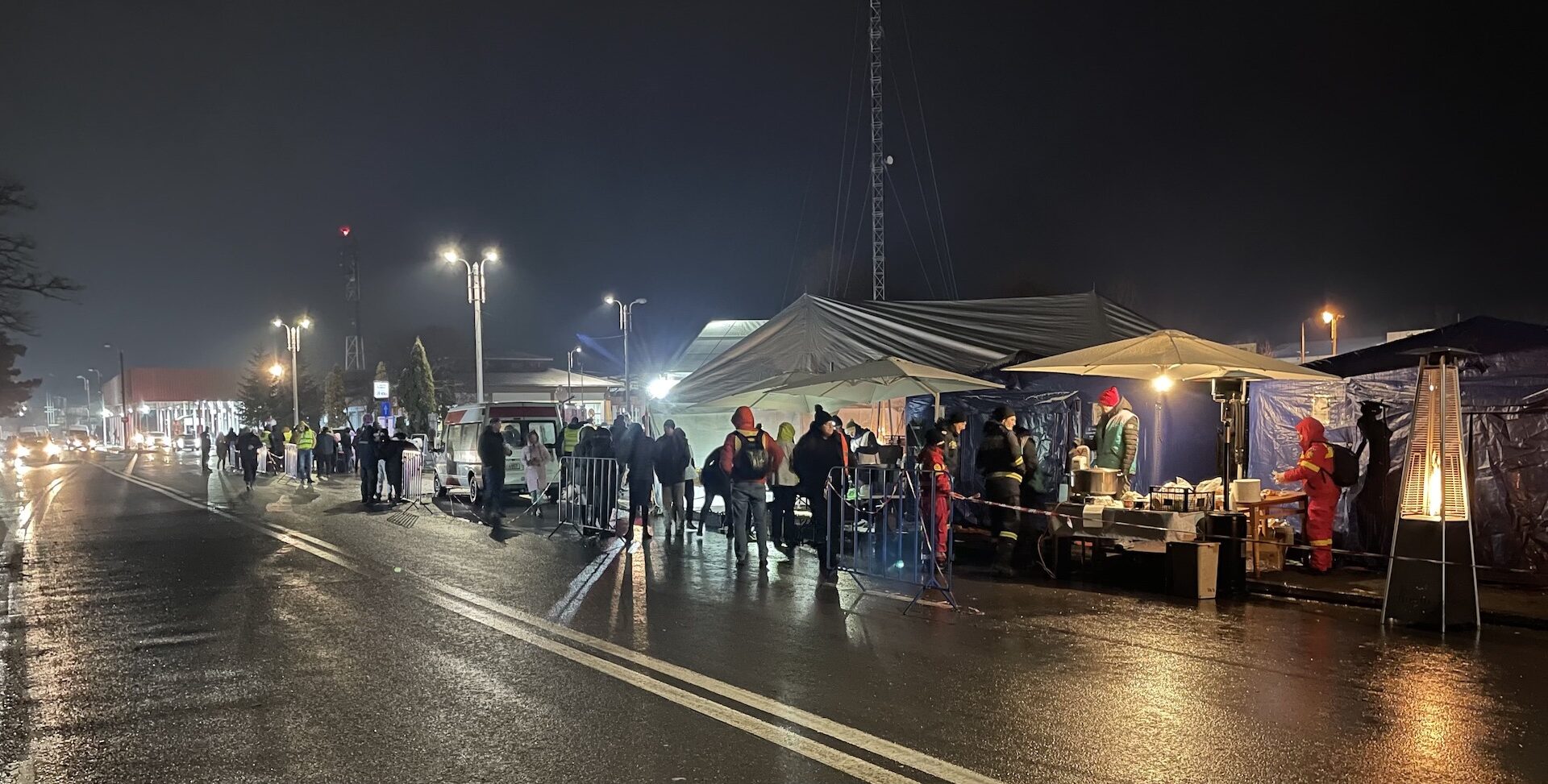 A row of emergency services tents welcoming refugees at the Romania-Ukraine border