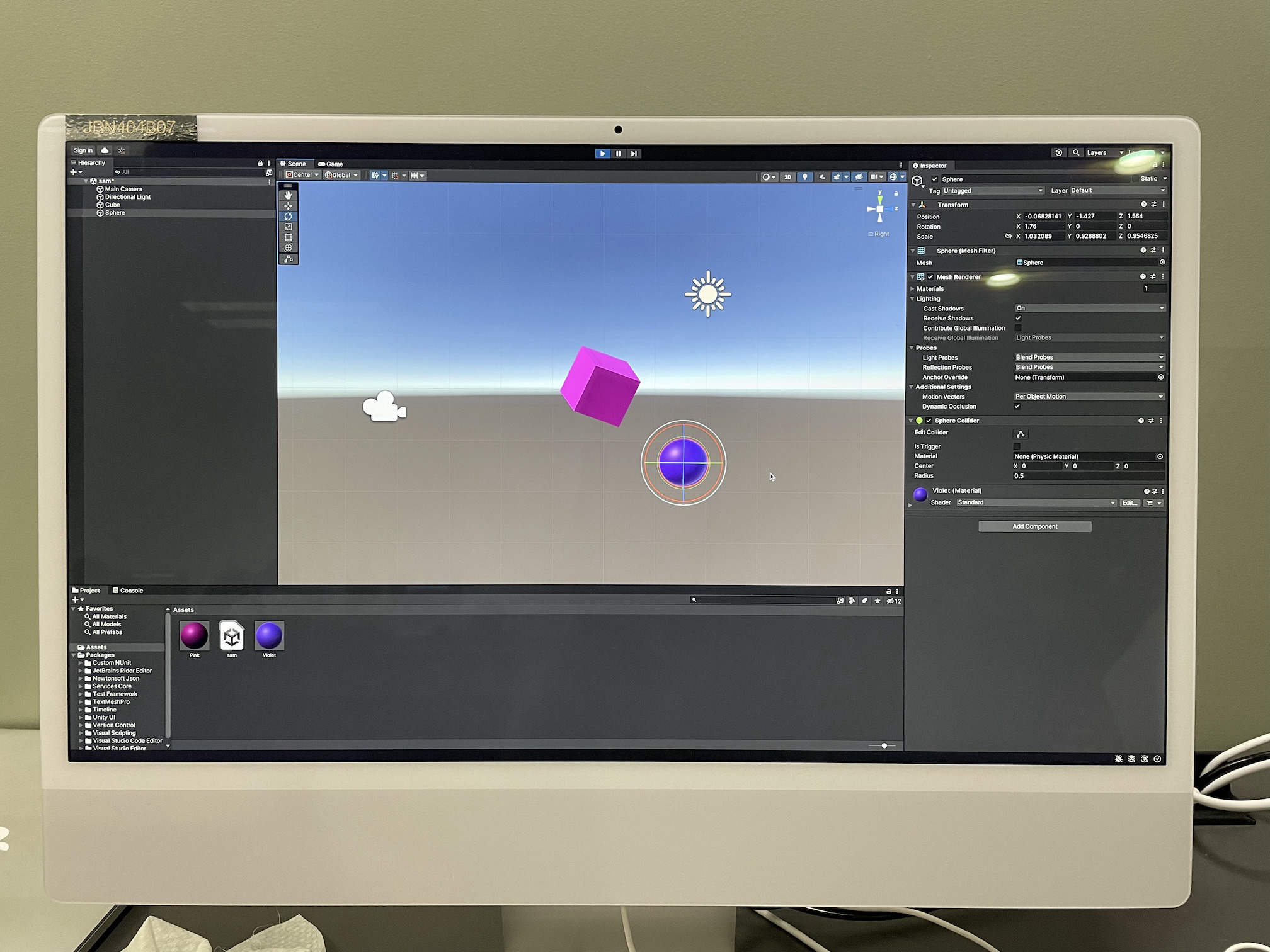 The Unity game environment with some basic objects, shown on a computer screen