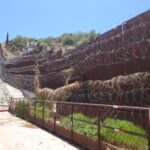 The border fence that divides Nogales, Arizona from Nogales, Sonora