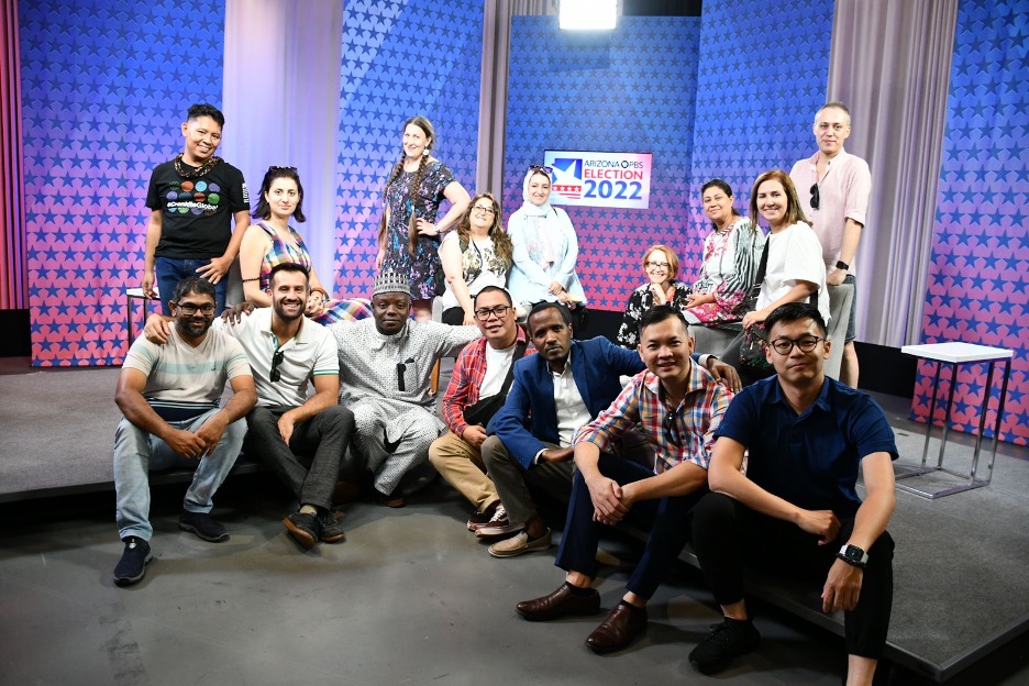 The scholars take over Arizona PBS Studio A for a group photo on set