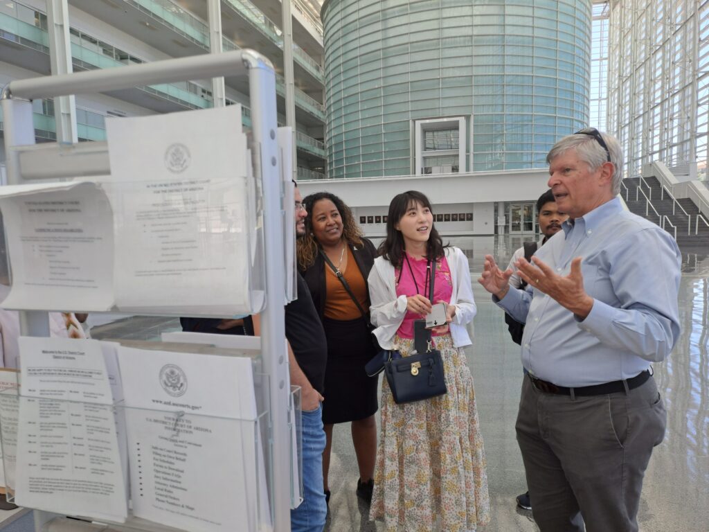 Dan Barr and the scholars chat at the Federal Court building