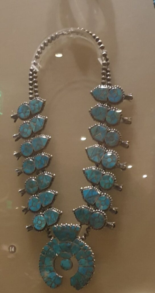 An elaborate turquoise and silver necklace