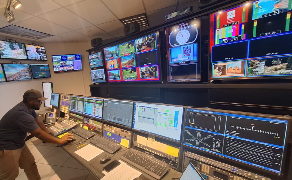 A scholar in the Arizona PBS control room