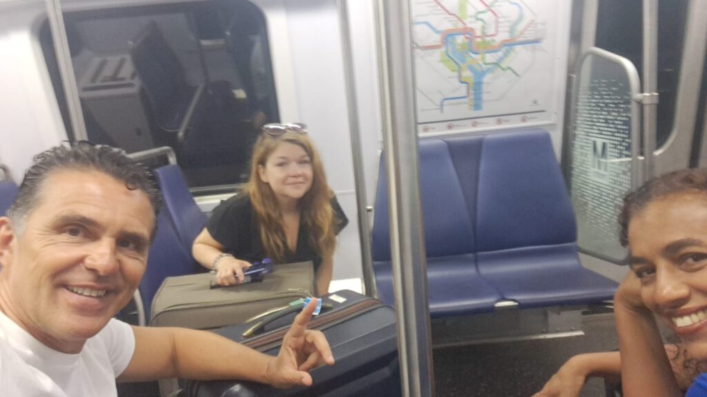 Scholars on the metro, on their way to the airport