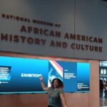 The entrance lobby and sign with the name of the National Museum of African American History and Culture