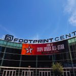 The front façade of the Footprint Center in downtown Phoenix on a sunny day