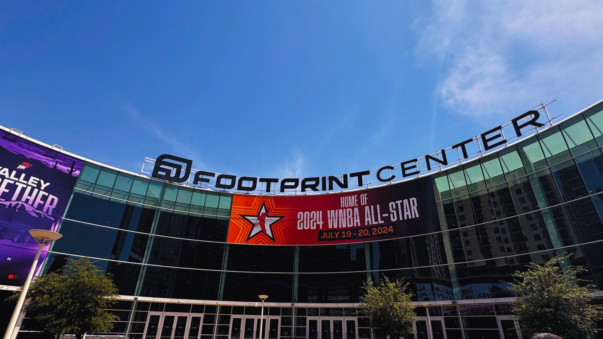 The front façade of the Footprint Center in downtown Phoenix on a sunny day