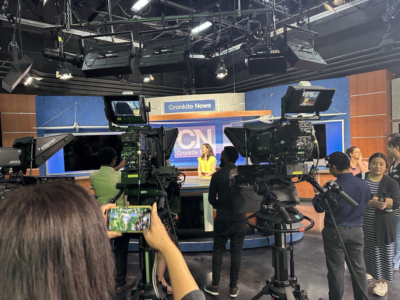 The scholars visited the CN studio on their very first day at ASU, and swarmed the set